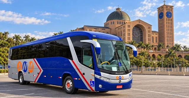 Ônibus da AWM em estacionamento com o Santuário Nacional de Aparecida ao fundo (imagem ilustrativa)